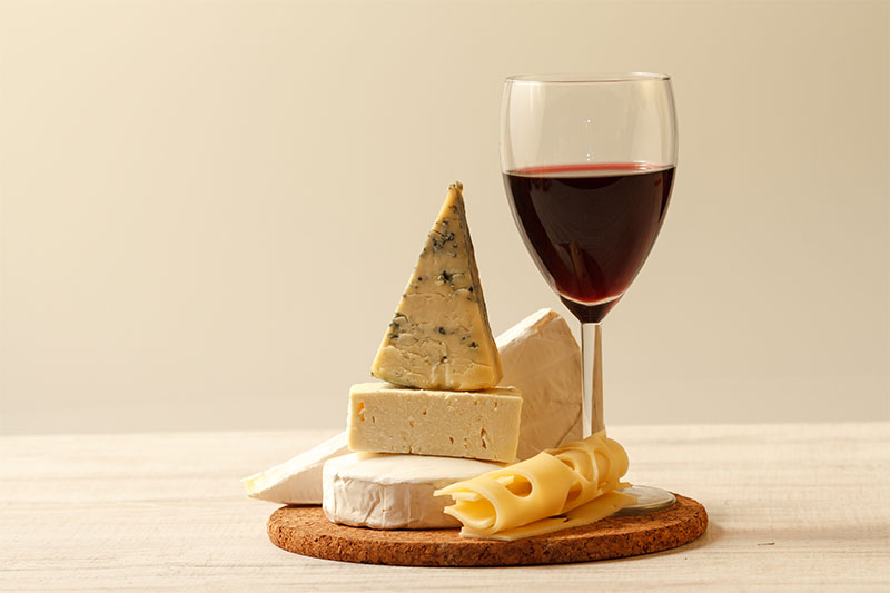 Consuming More Cheese And Wine Could Prevent Dementia Later In Life, According To Study